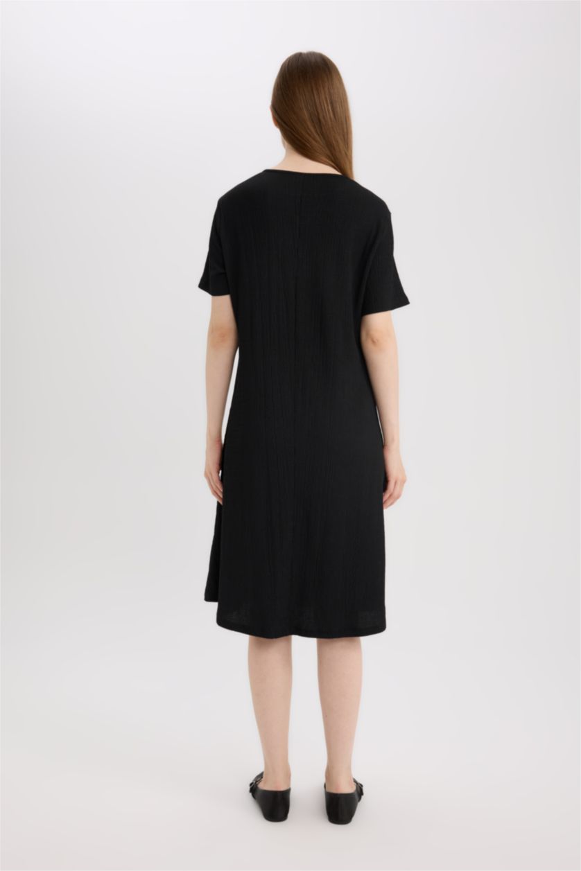 نساء أسود فستان قصير منسوج قصة عادية بياخة مستديرة