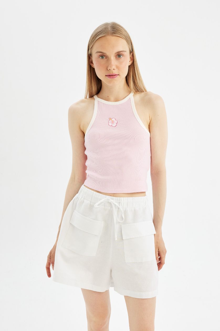 نساء زهري كروب توب مضلع بطبعة شعار