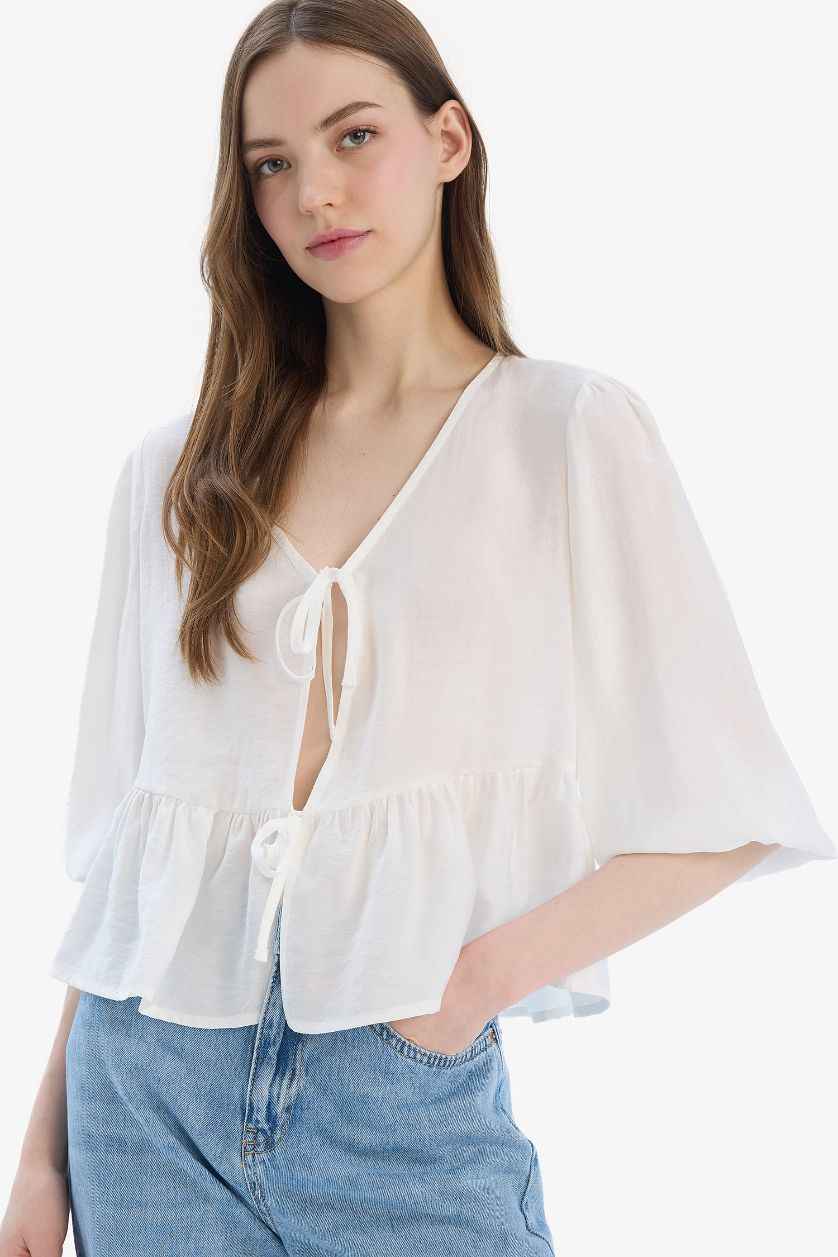 Woman White Regular Fit V Neck Front Tied Blouse