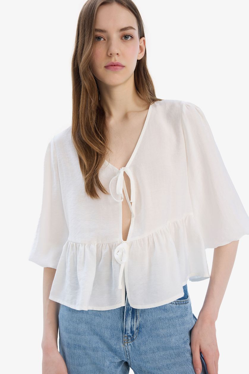 Woman White Regular Fit V Neck Front Tied Blouse