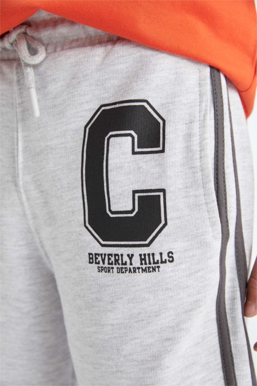 أولادي ميلانج رمادي شورت اولادي خفيف قصة عادية