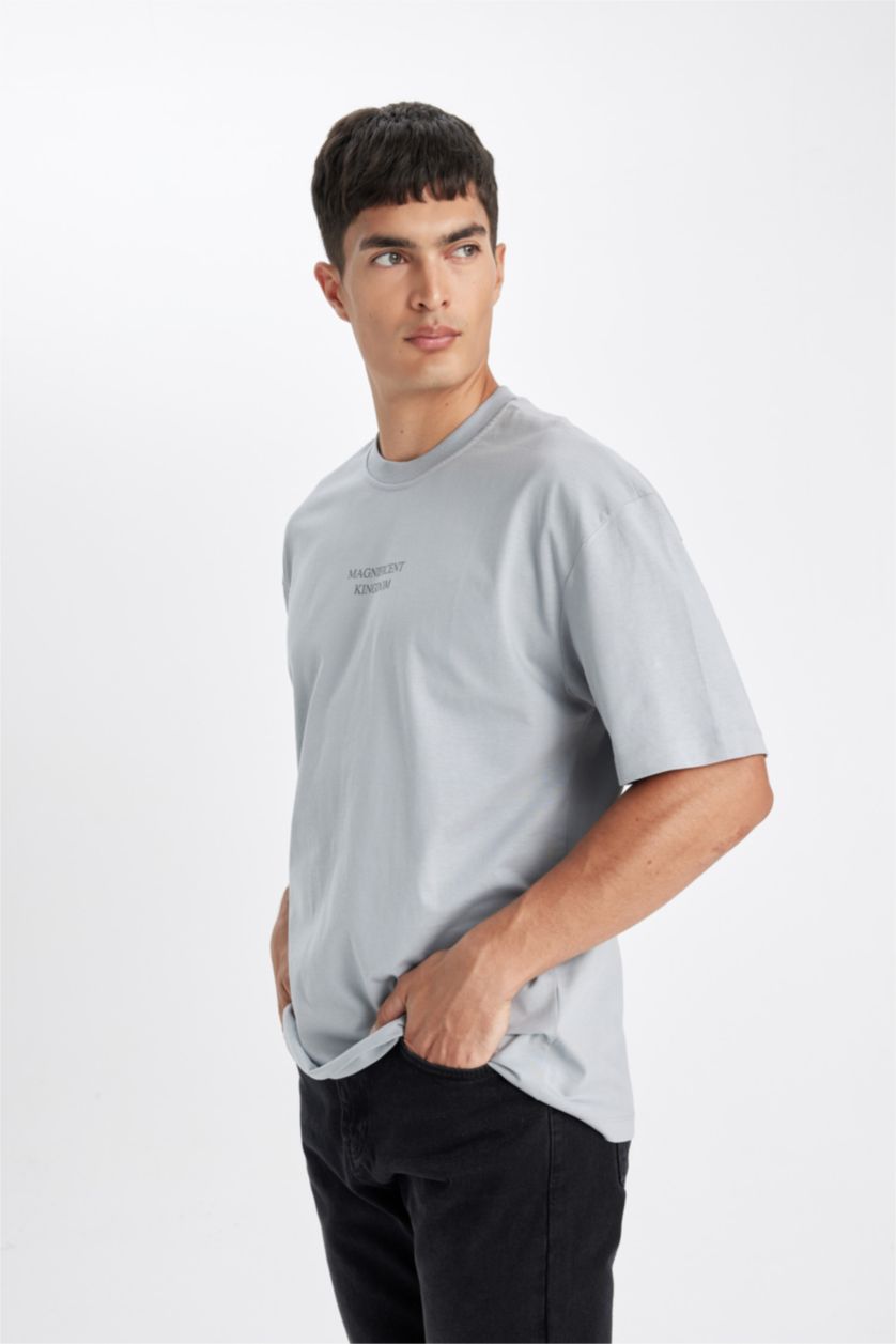 رجال رمادي تيشيرت نص ردن اوفر سايز بطبعة من الخلف