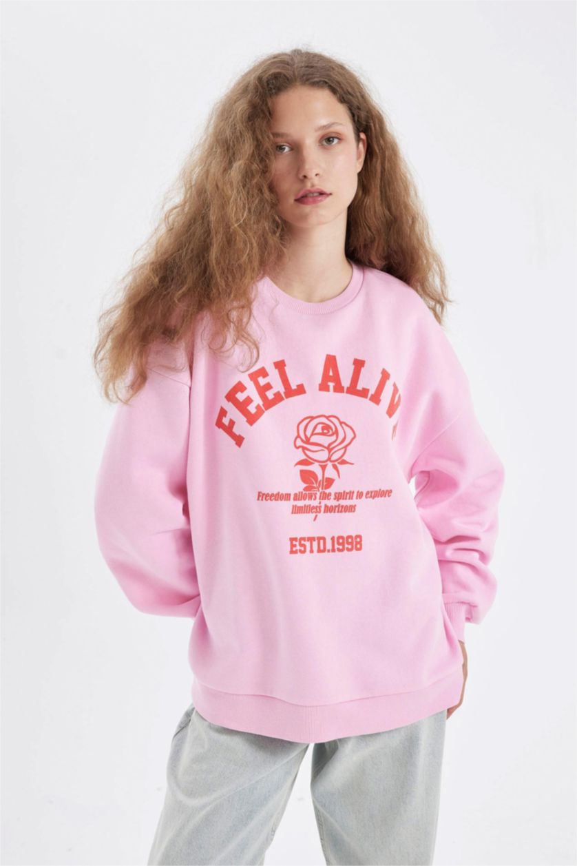 نساء زهري فاتح سويت شيرت واسع قماش سميك