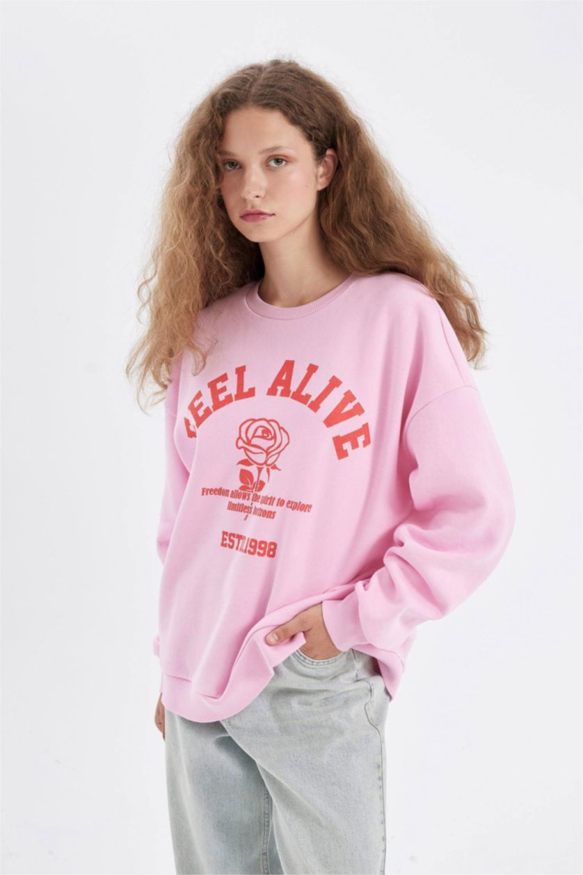 نساء زهري فاتح سويت شيرت واسع قماش سميك