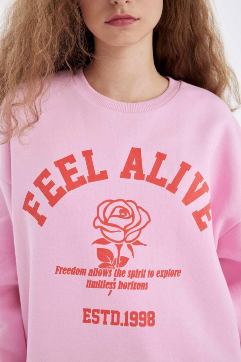 نساء زهري فاتح سويت شيرت واسع قماش سميك