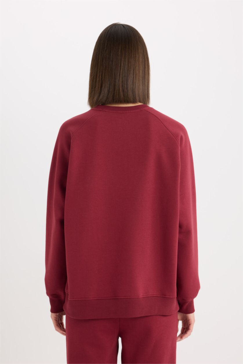 نساء خمري سويت شيرت واسع برقبة مستديرة