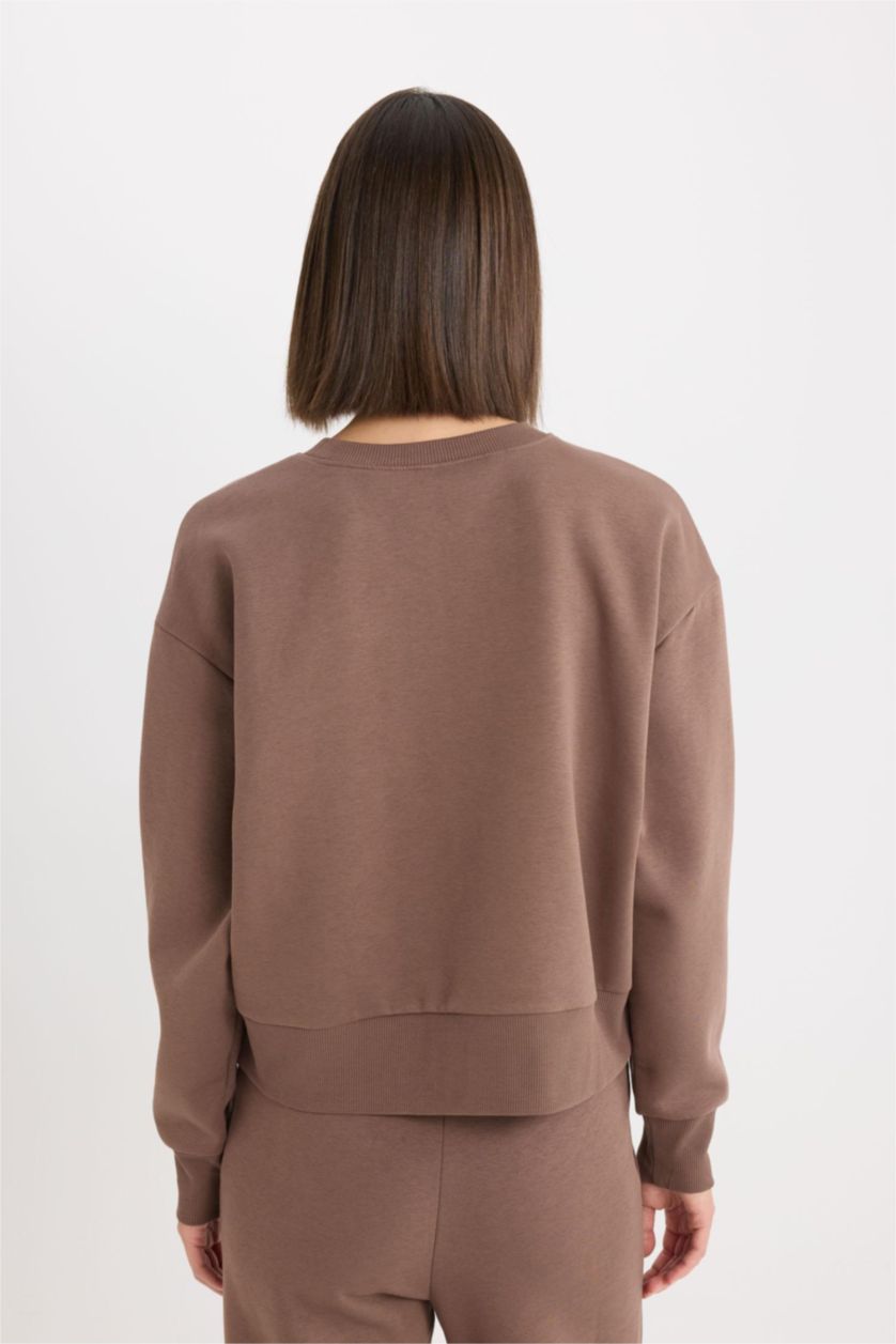 نساء بني سويت شيرت واسع برقبة مستديرة