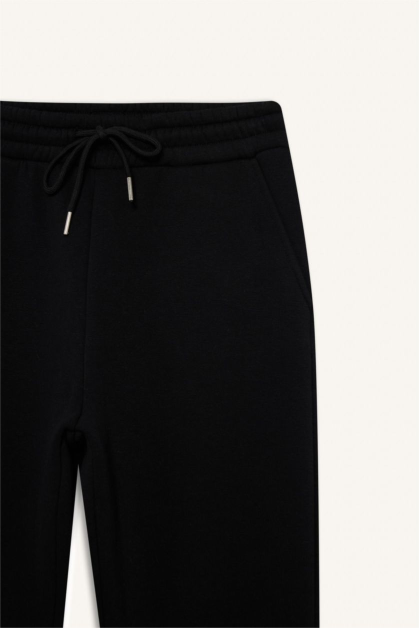 حريمي أسود بنطلون تقيل جوجر فيت بجيب