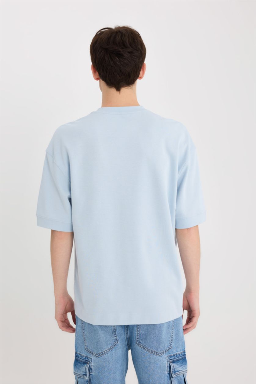 رجال أزرق فاتح تيشيرت نص ردن مطبوع قصة فضفاضة بياخة مستديرة