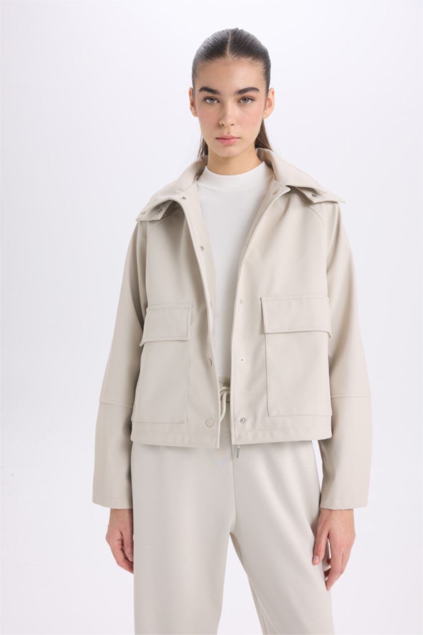 حريمي بيج فاتح جاكيت مطر وتر بروف قصة عادية بكابيشون