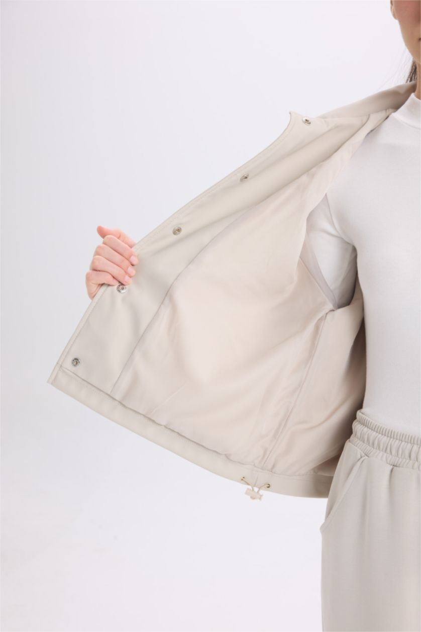 حريمي بيج فاتح جاكيت مطر وتر بروف قصة عادية بكابيشون