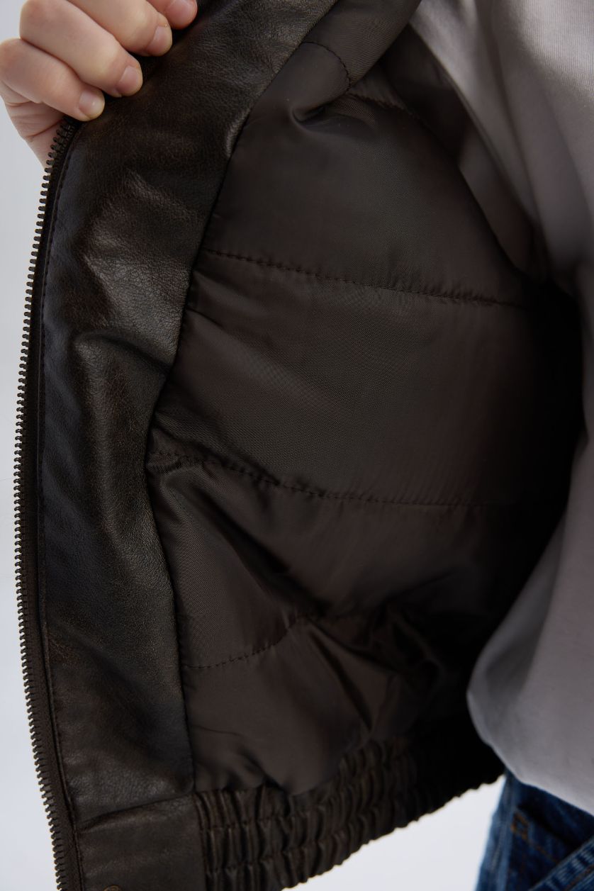 أولادي بني جاكيت جلد صناعي اولادي وتر بروف بياقة بولو بسوسته