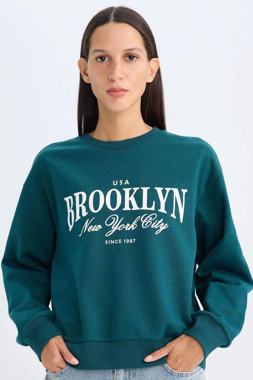 نساء أخضر غامق سويت شيرت قصة عادية برقبة مستديرة بطبعة