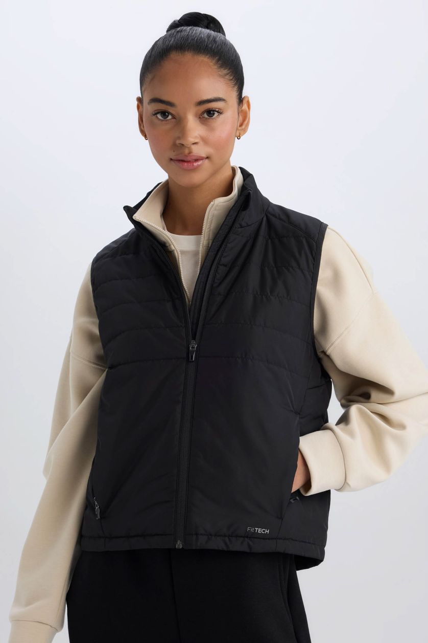 نساء أسود يلك نفخ رياضي قصة عادية بجيب مقاوم للماء من DeFactoFit