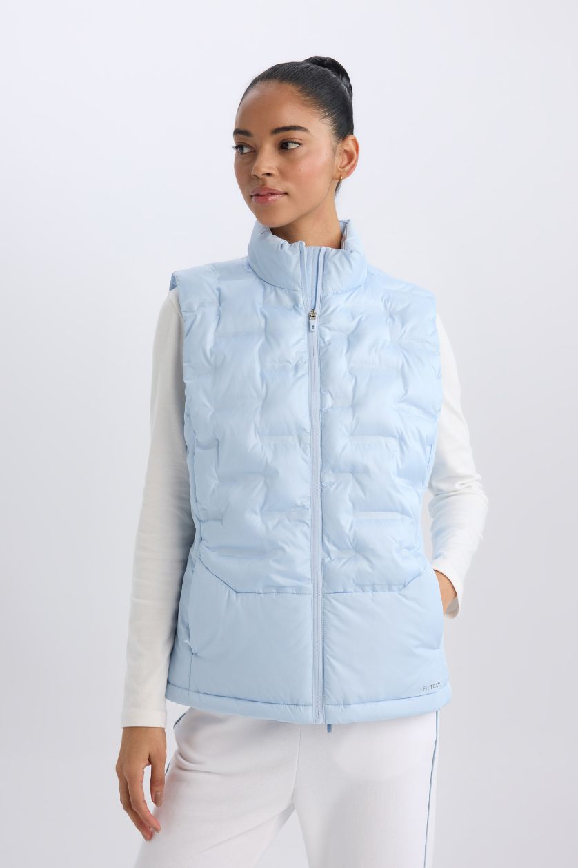 نساء أزرق فاتح يلك نفخ رياضي قصة عادية بجيب مقاوم للماء من DeFactoFit