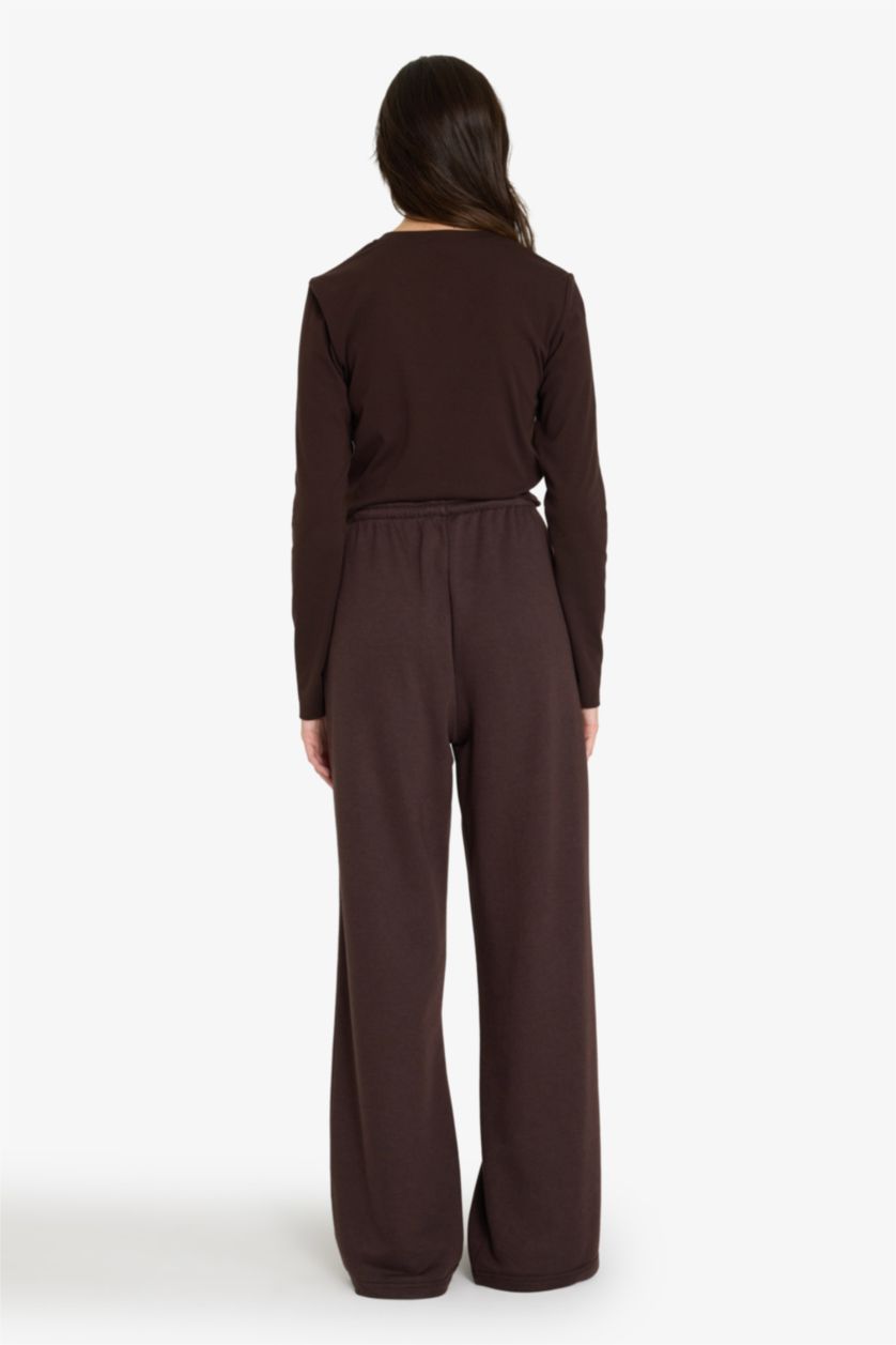 حريمي بني بنطلون قصة مستقيمة