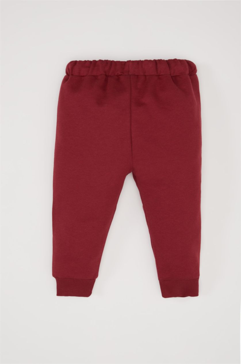 طفل صغير خمري بنطلون سويت بانتس بيبي اولادي بطبعة شعار وقصة عادية خمري