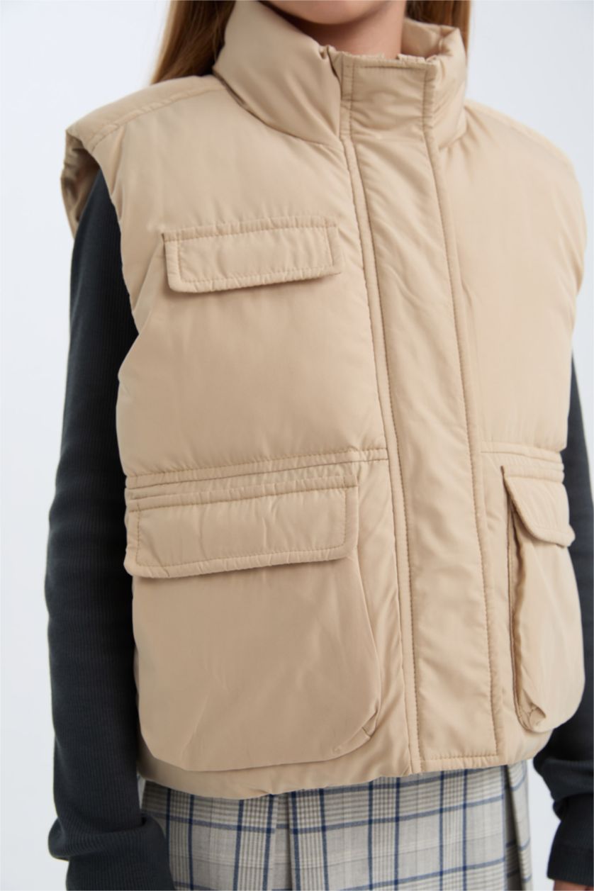 Kız Çocuk - Genç Kız Açık Bej Su Geçirmez Dik Yaka Fermuarlı Cepli Şişme Yelek Kız Çocuk