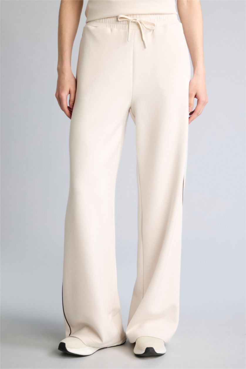 FEMME Écru Jambes larges
