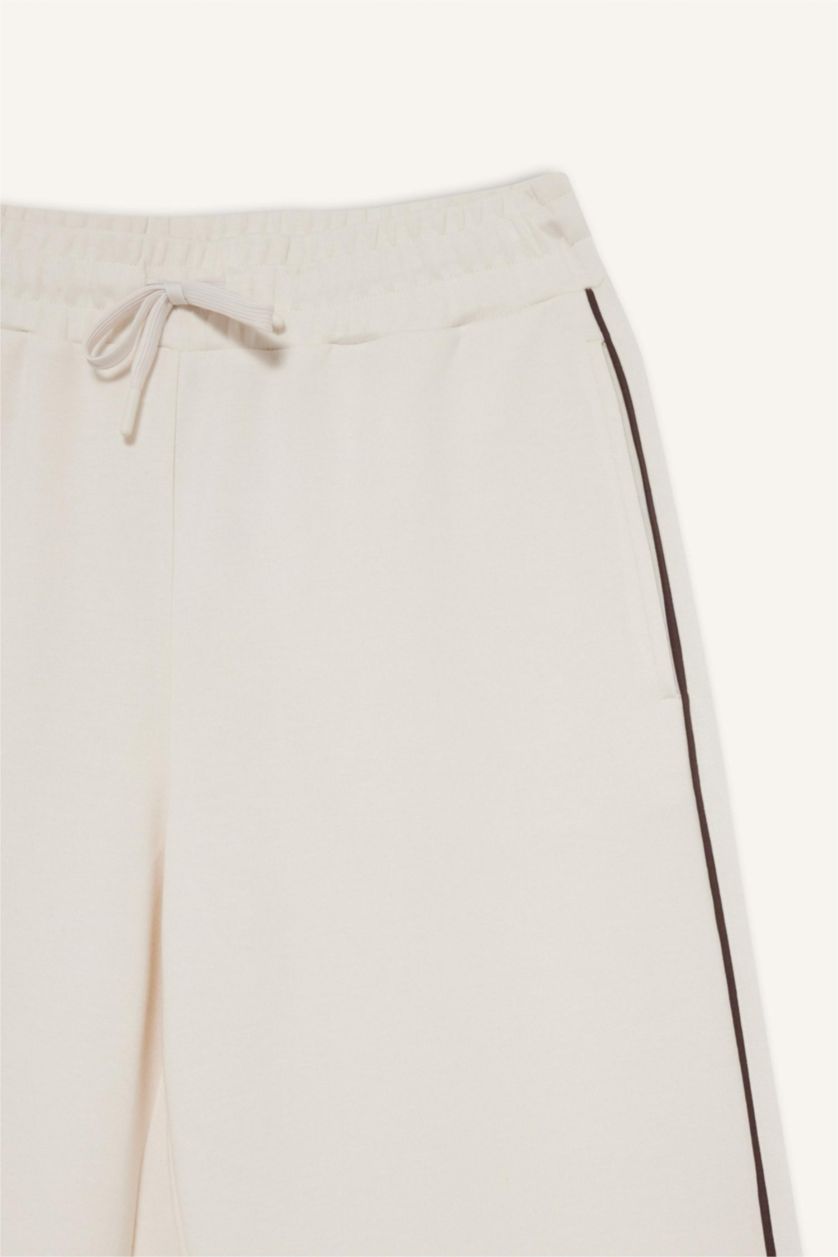 FEMME Écru Jambes larges