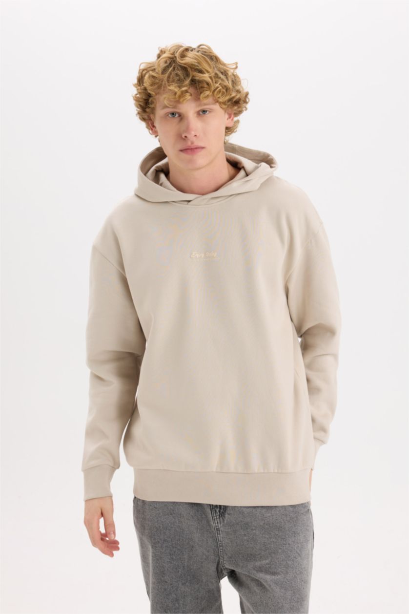 رجالي بيج سويت شيرت اوفر سايز بيج بكابيشون وطبعة من الخلف