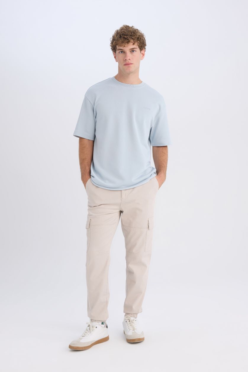 رجال أزرق فاتح تيشيرت أوفر سايز برقبة مستديرة