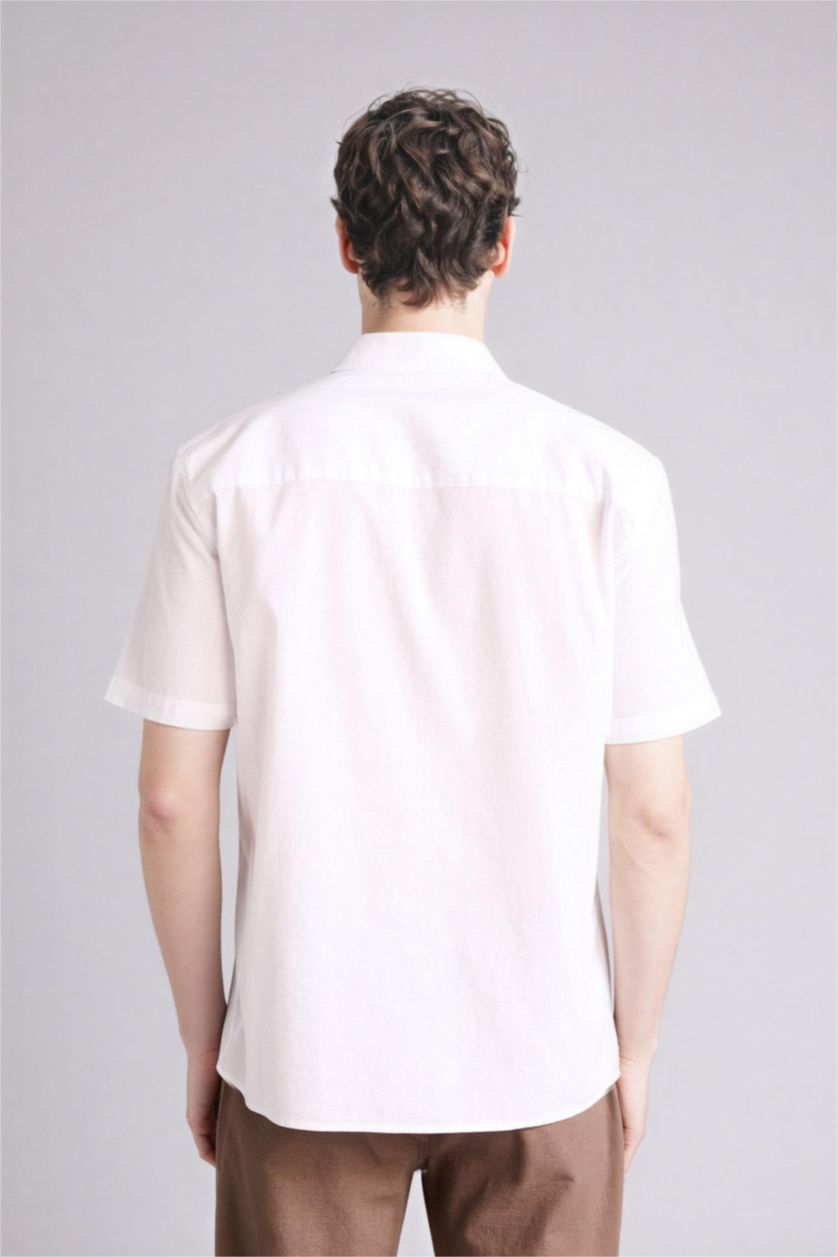 Man White قميص بيزك سادة قطن