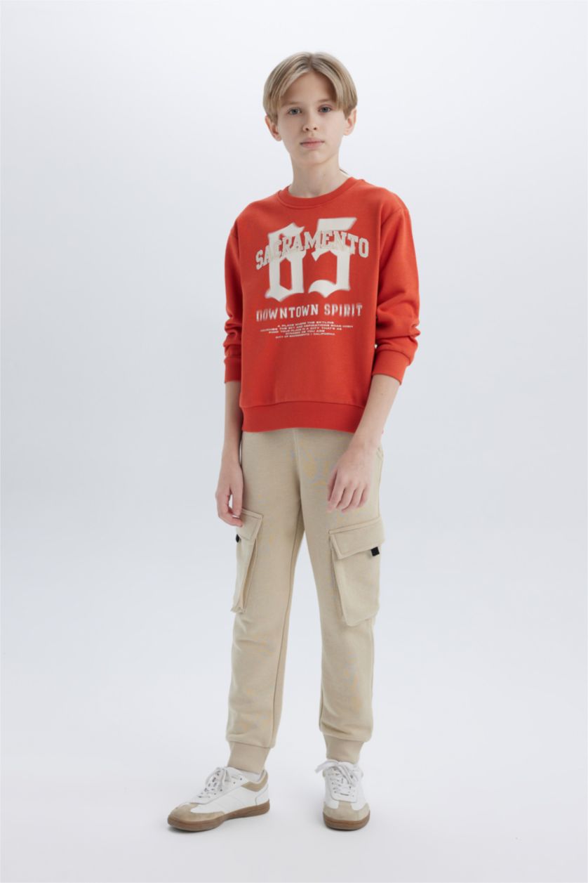 أولاد برتقلي غامق سويت شيرت ولادي قصة عادية بياخة مستديرة