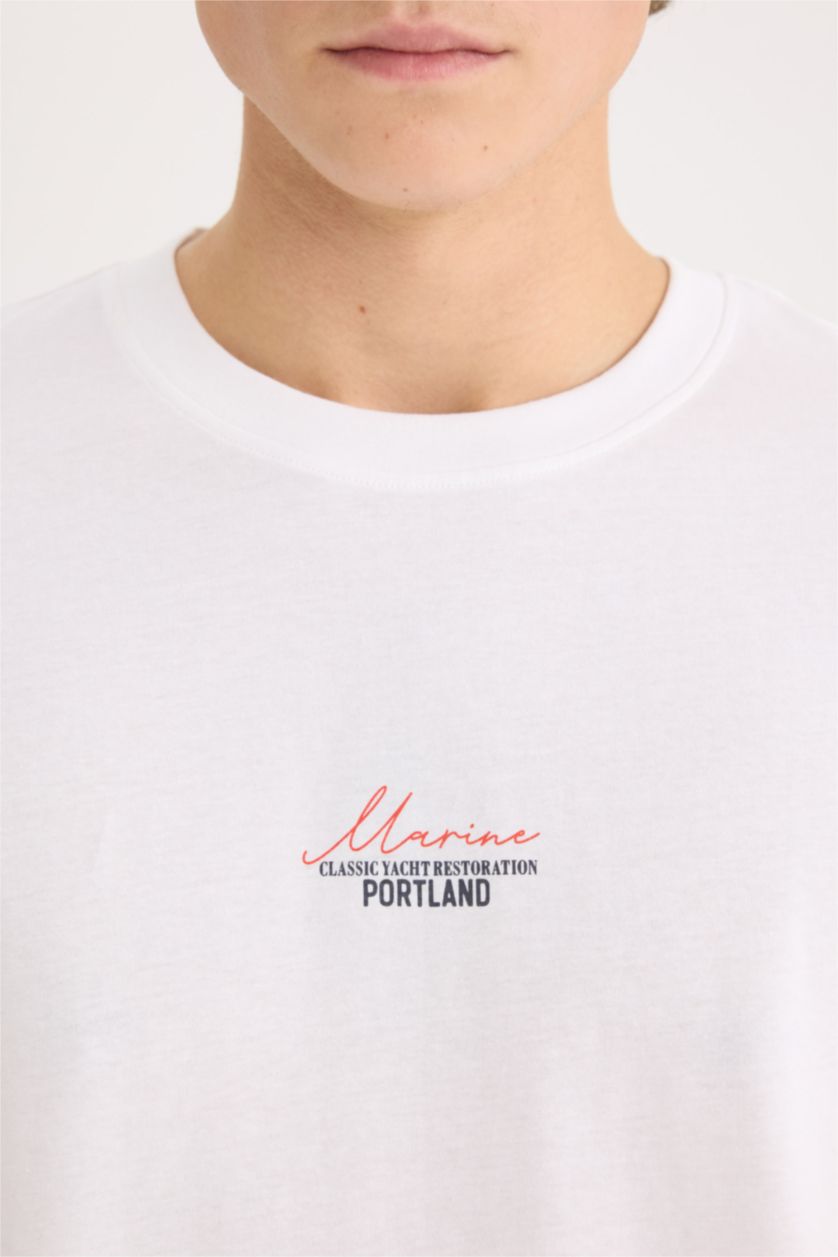 Erkek Beyaz %100 Pamuk Oversize Geniş Kalıp Bisiklet Yaka Sırt Baskılı Kısa Kollu Tişört