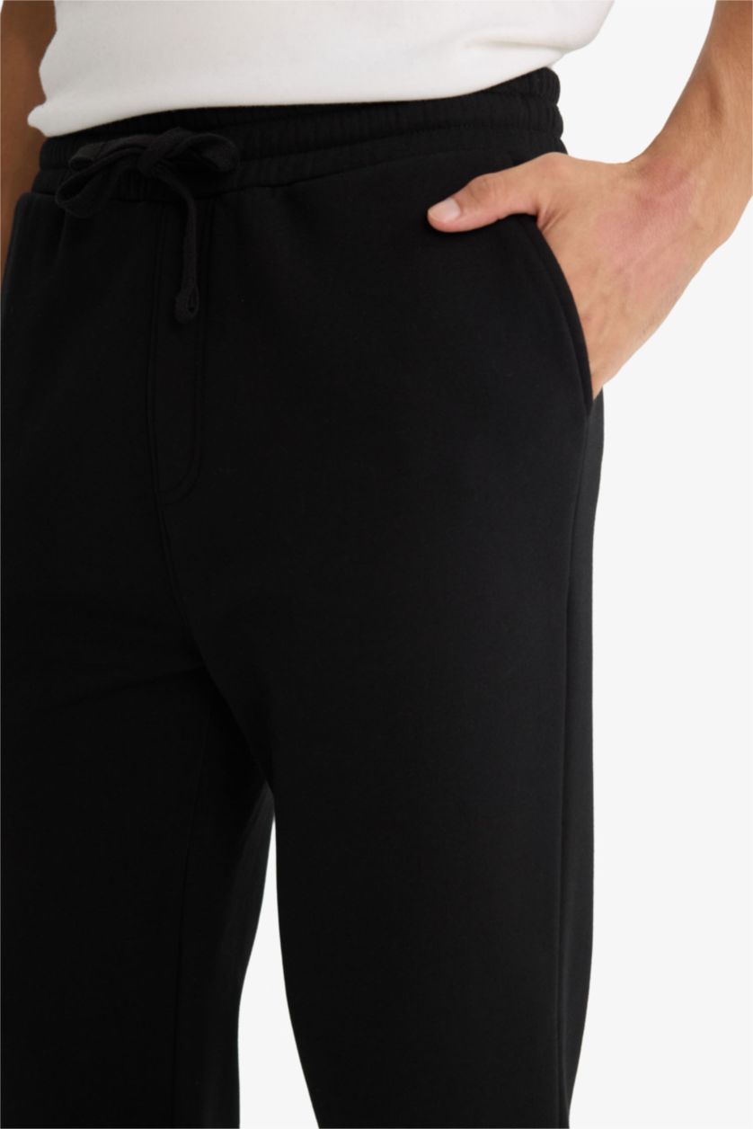 MAN Black Regular Fit Trousers