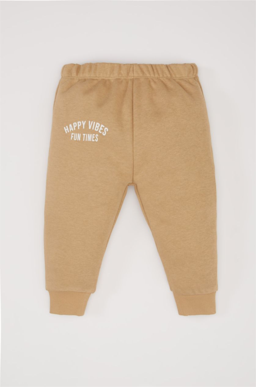 طفل صغير بيج طقم بيبي اولادي بطبعة شعار قماش رقيق قصة عادية من قطعتين