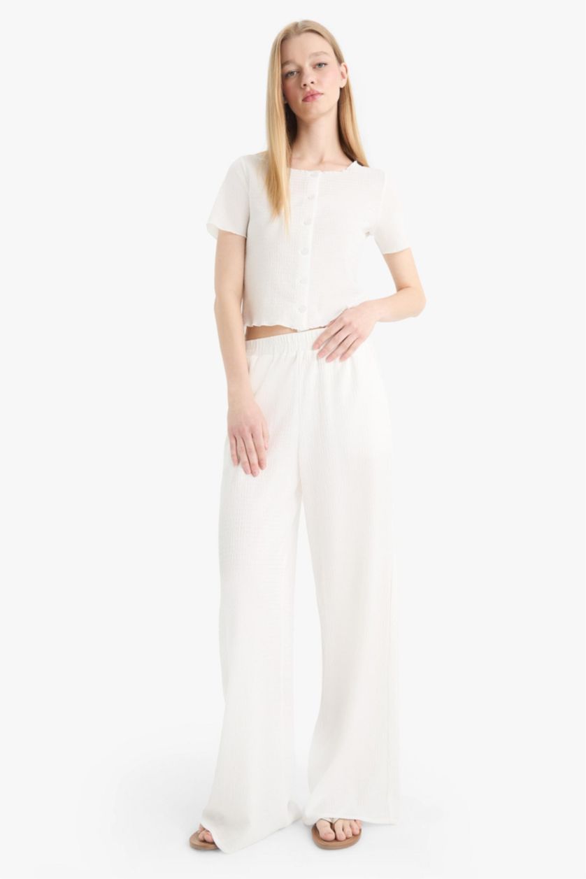 نساء اوف وايت سروال كريب واسع بخصر مطاطي