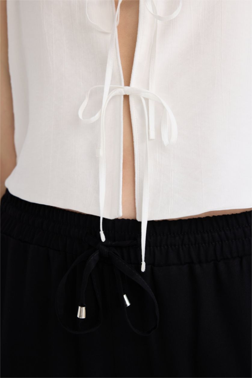 Женщины Кремовый Кроп топ с V-образным вырезом и без рукавов из ткани кринкля