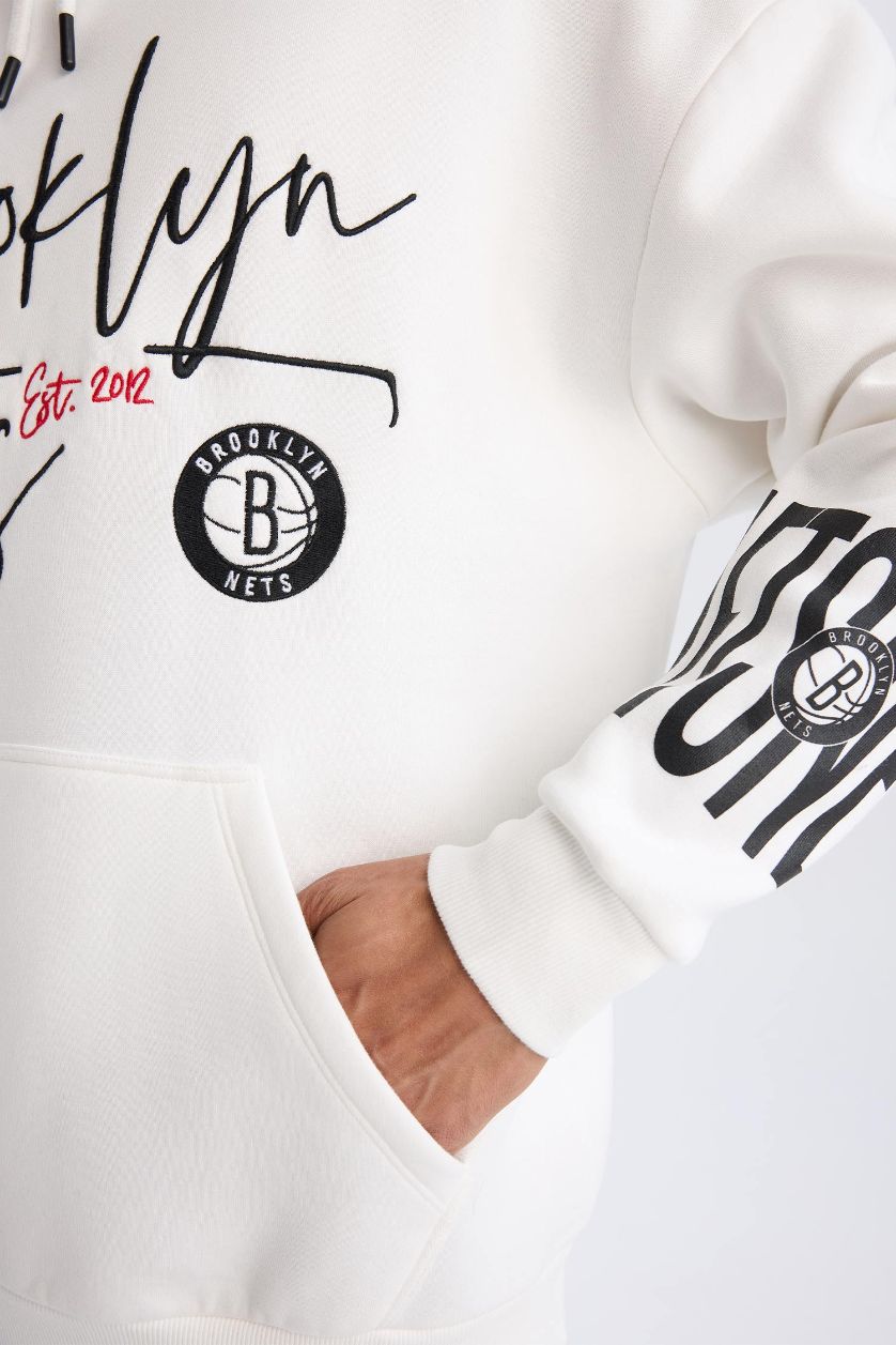 رجالي بيج فاتح سويت شيرت رياضي اوفر سايز بكابيشون بجيب من DeFactoFit