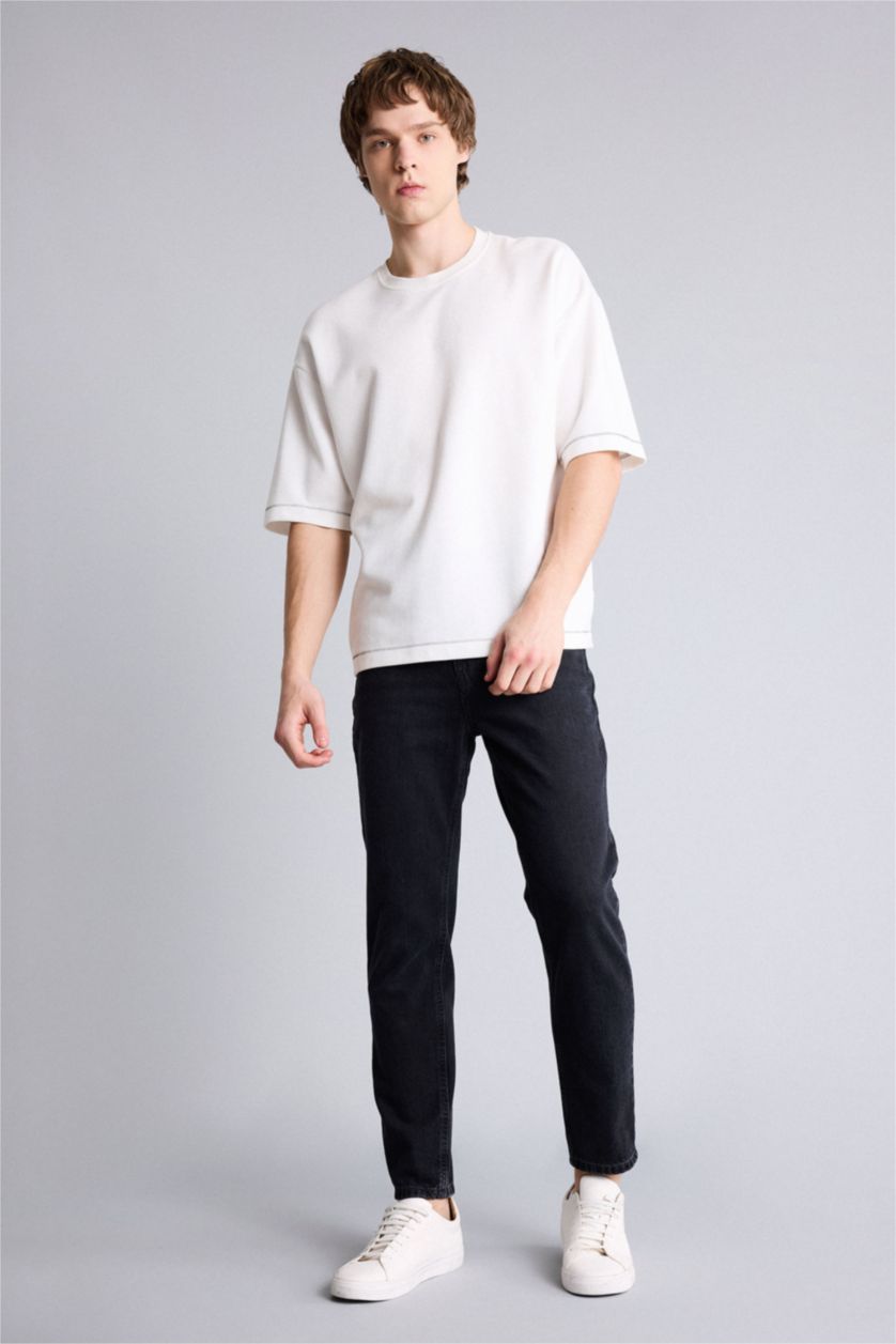 MAN Black 90’S Slim Fit Super Skinny Hem Denim Trousers