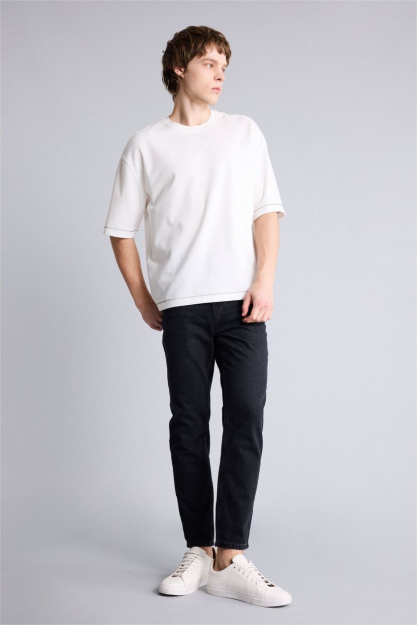 MAN Black 90’S Slim Fit Super Skinny Hem Denim Trousers