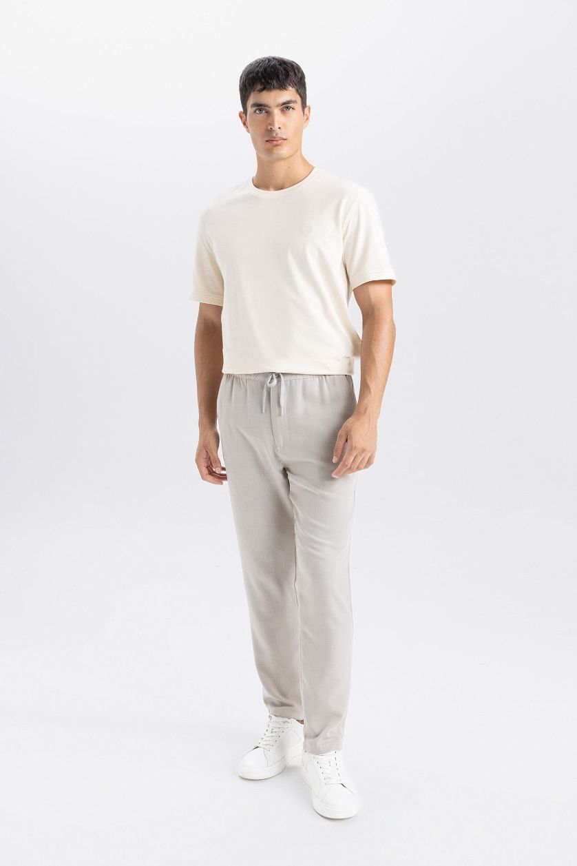 Erkek Açık Gri Yazlık Jogger Pantolon Slim Fit Dar Kesim Beli Bağcıklı Cepli Düz Paça