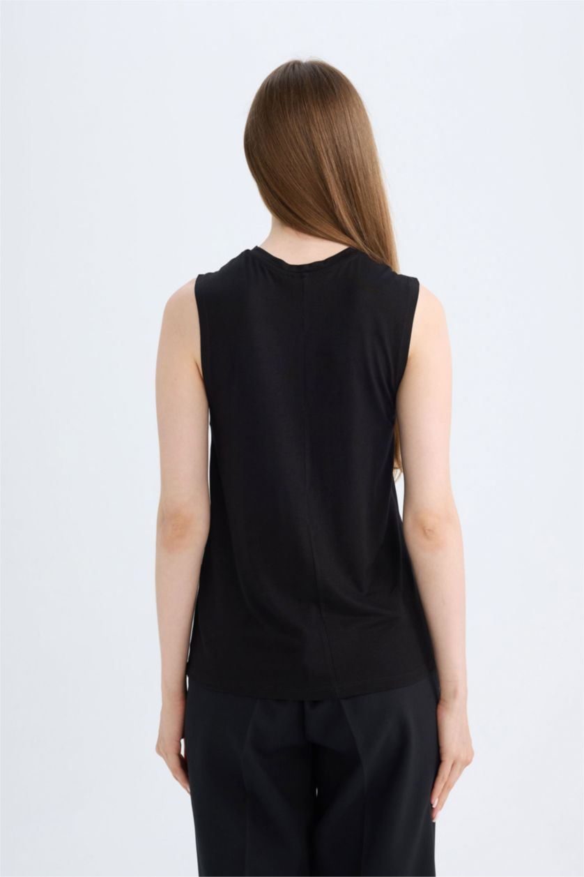 نساء أسود تونيك تيشيرت سامبل قصة مريحة بدون كم