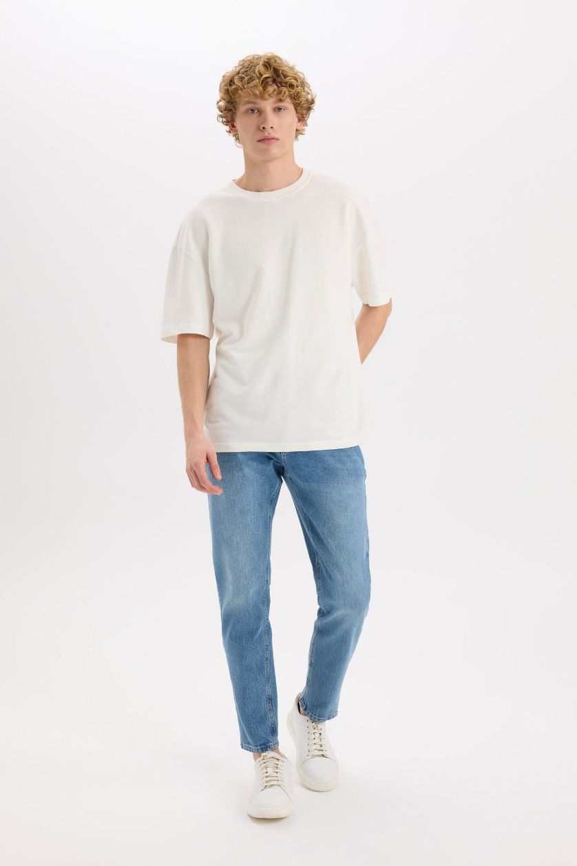 Erkek Mavi Slim Tapered Fit Dar Kalıp Normal Bel Daralan Paça Jean Pantolon