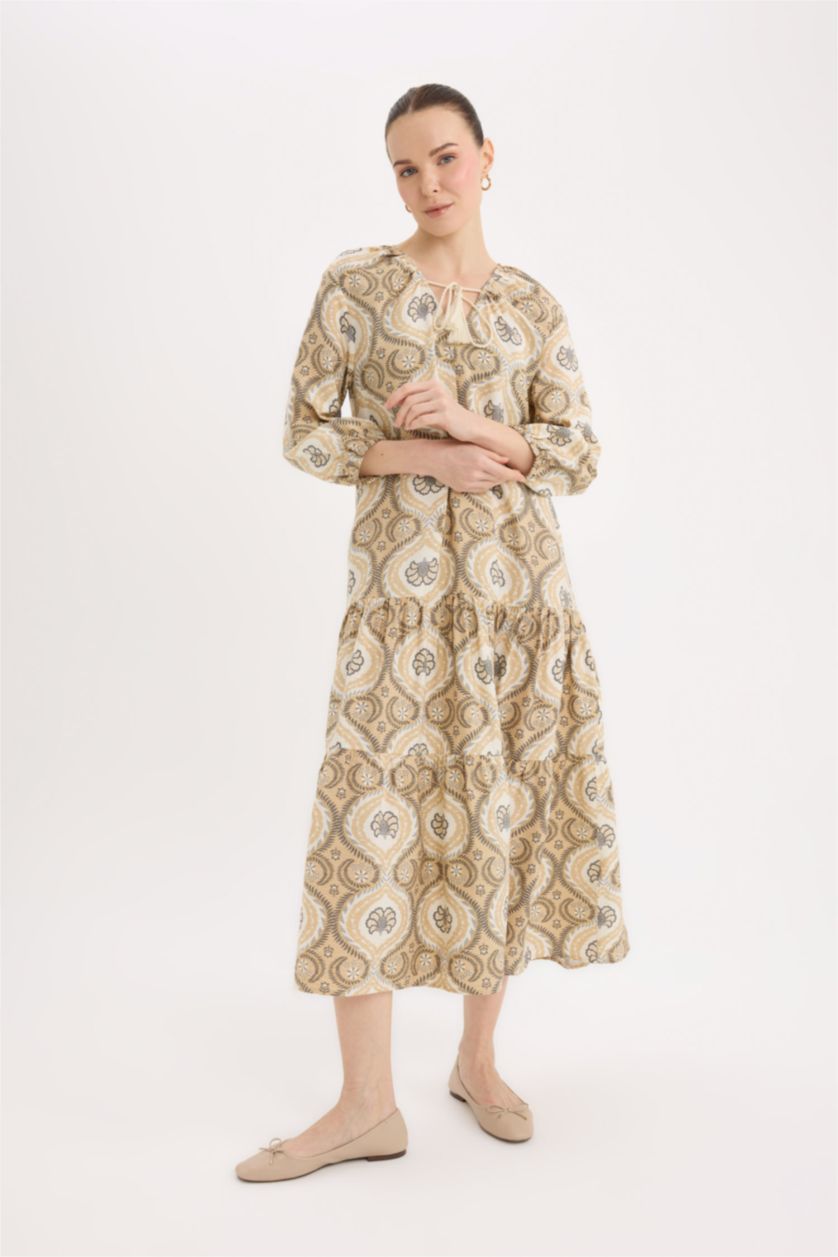 حريمي بني فاتح فستان طويل بقصة A بياقة V