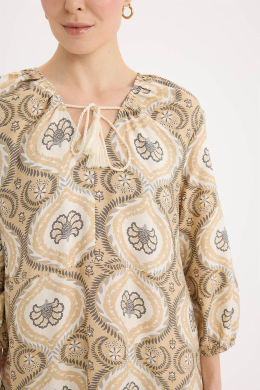 حريمي بني فاتح فستان طويل بقصة A بياقة V