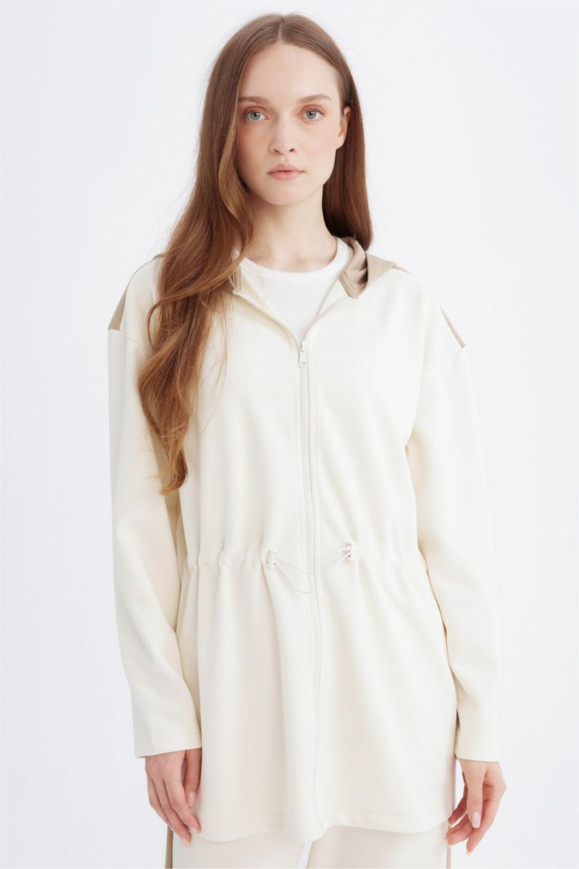 حريمي بيج فاتح سويت شيرت قصة مريحة بكابيشون بسوسته