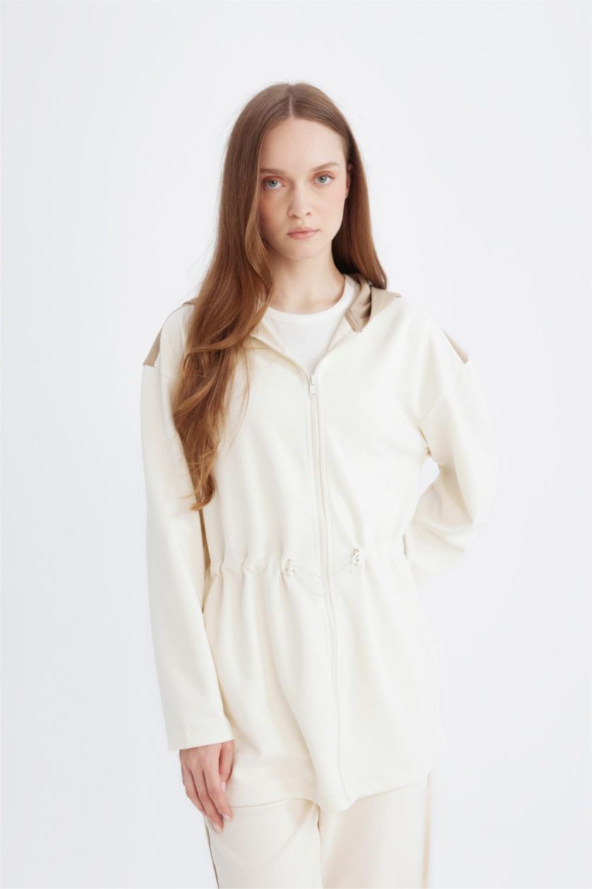 حريمي بيج فاتح سويت شيرت قصة مريحة بكابيشون بسوسته