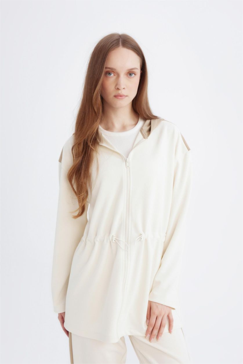 حريمي بيج فاتح سويت شيرت قصة مريحة بكابيشون بسوسته