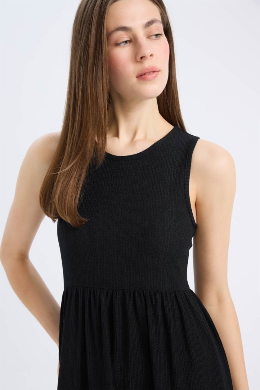 نساء أسود فستان ميدي كت منسوج بياخة مدورة