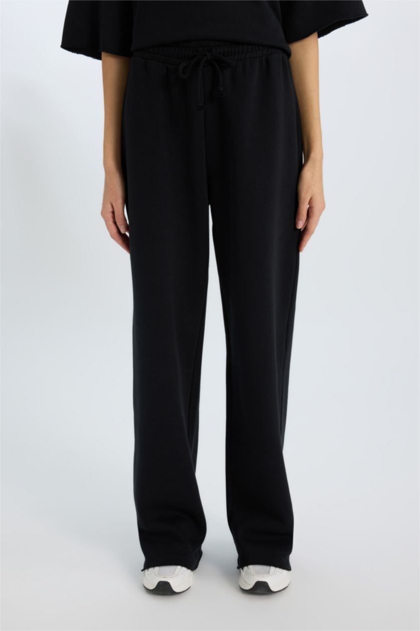 Әйелдерге қара кең аяқ Шалбар