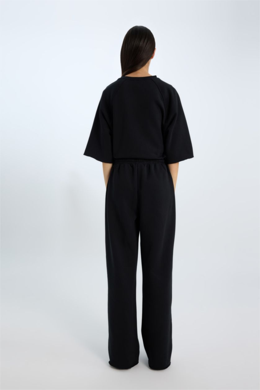 Әйелдерге қара кең аяқ Шалбар