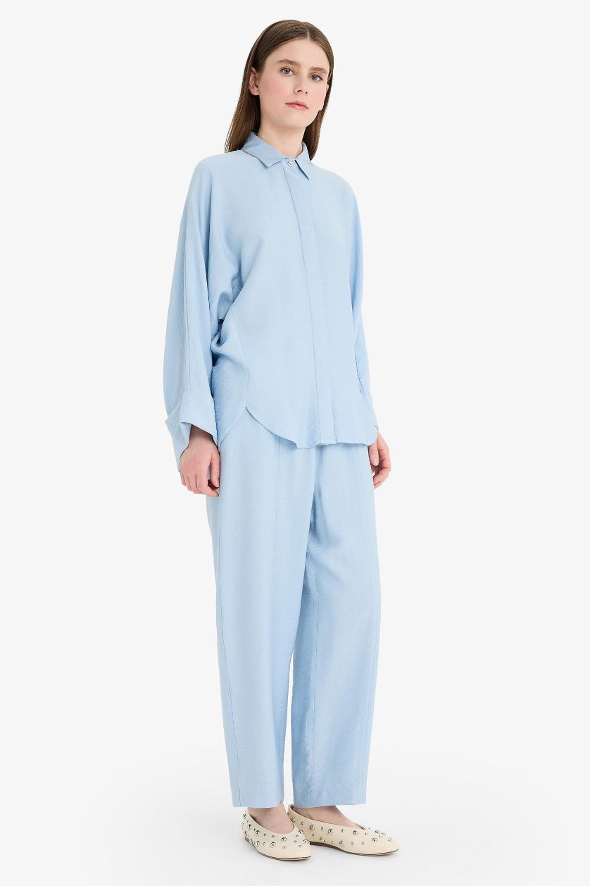 حريمي أزرق فاتح بنطلون برجل واسع قصة عادية من مزيج الكتان