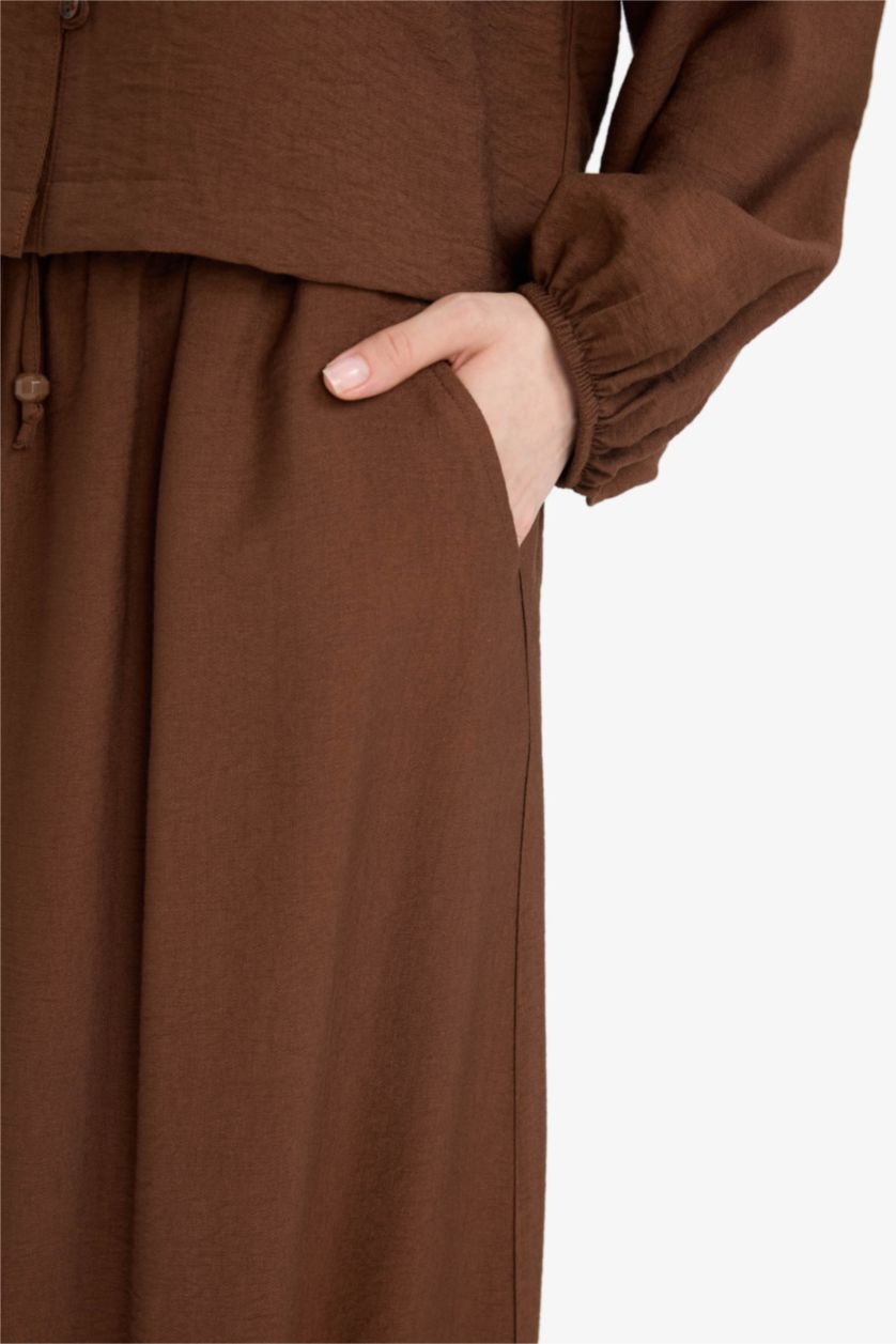 WOMAN Brown A Cut