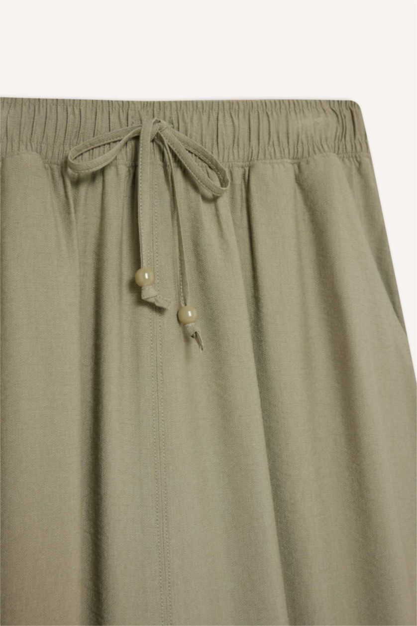 WOMAN Green A Cut